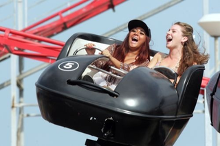 Illustration for article titled Gallery: Snooki's Joyous Sunday In The (Amusement) Park